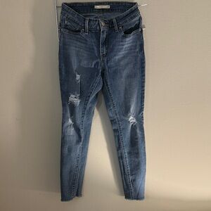 Slim Distressed Skinny Jeans in Medium Blue